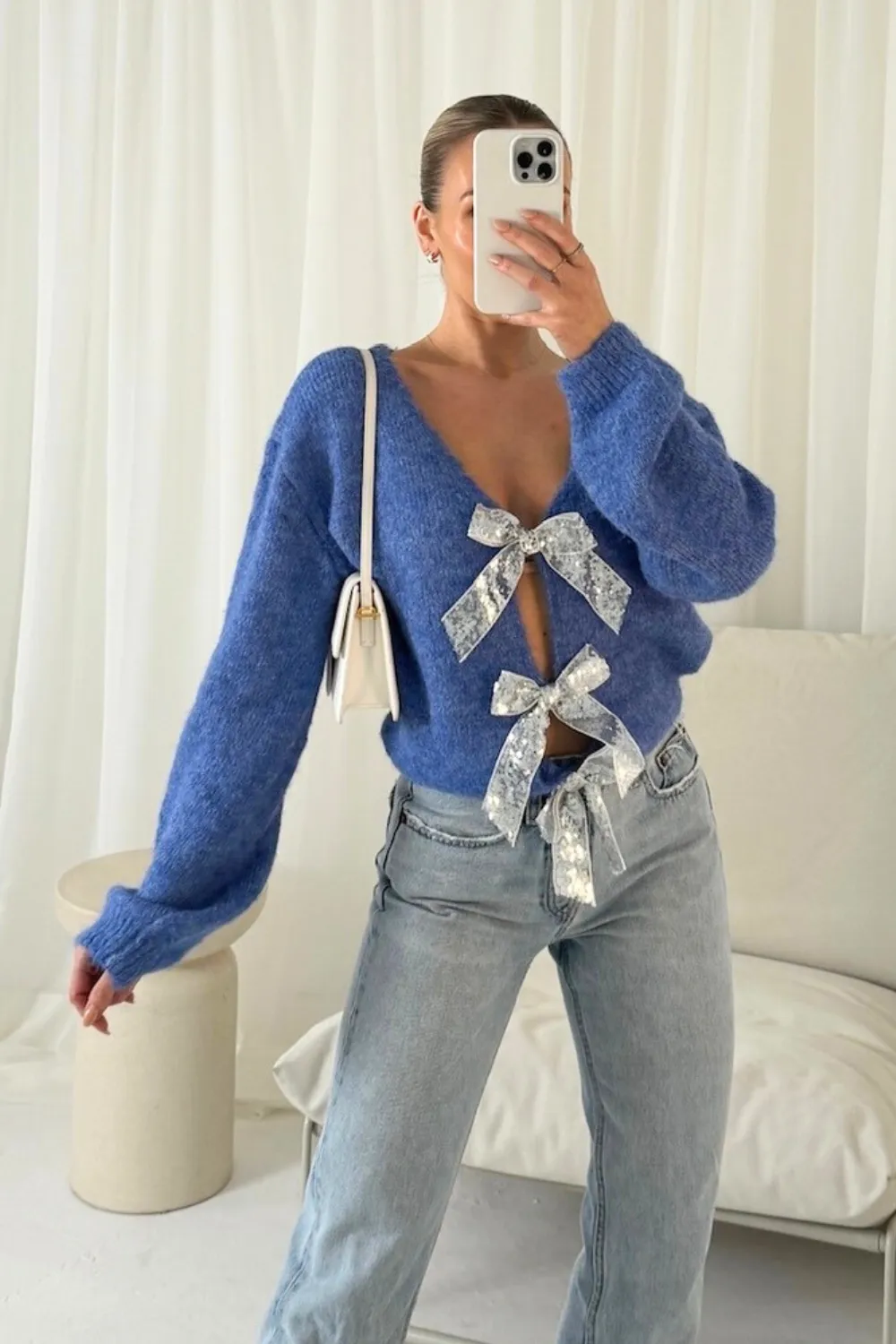 Eden blue sequin bow knit jumper