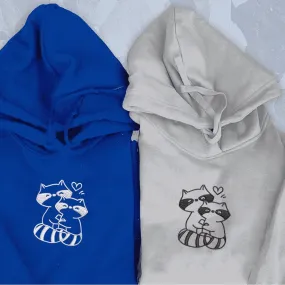 Hugging Raccoon Couple Hoodies - Custom Embroidered Matching Hoodies For Couples